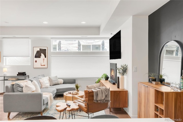 1238 Quitman St Unit 2, Denver, CO 80204 - living area featuring wood finished floors, a warm lit fireplace, and recessed lighting