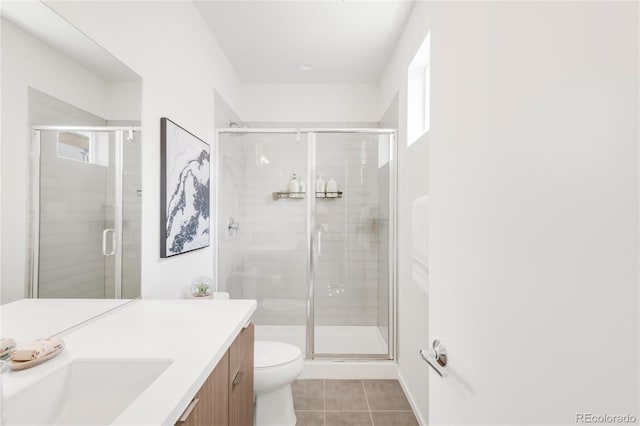1238 Quitman St Unit 2, Denver, CO 80204 - bathroom featuring tile patterned floors, vanity, and a shower stall