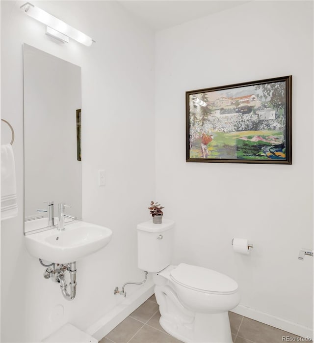 1238 Quitman St Unit 2, Denver, CO 80204 - bathroom featuring tile patterned floors and toilet