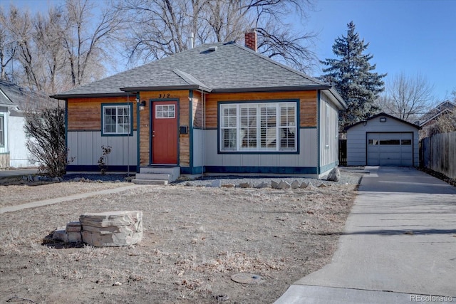 view of front of home featuring an outbuilding and a garage