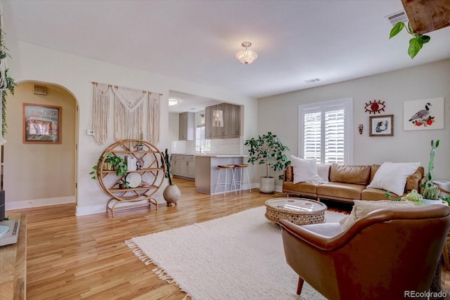 living room featuring light wood-type flooring