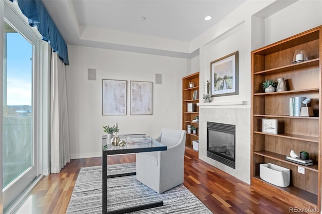 office space with hardwood / wood-style floors and a wealth of natural light