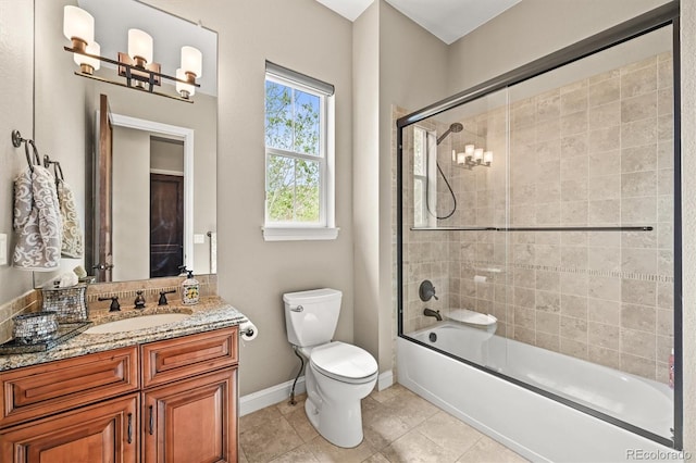 7367 S Tempe Ct, Aurora, CO 80016 - full bath featuring vanity, bath / shower combo with glass door, and tile patterned flooring