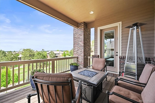 7367 S Tempe Ct, Aurora, CO 80016 - wooden terrace with an outdoor fire pit