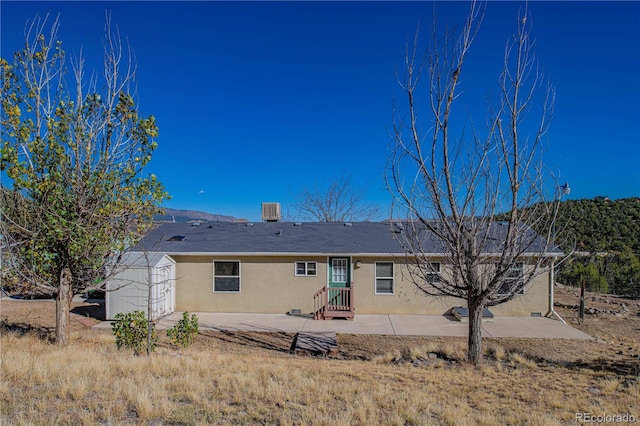 rear view of house featuring a patio area