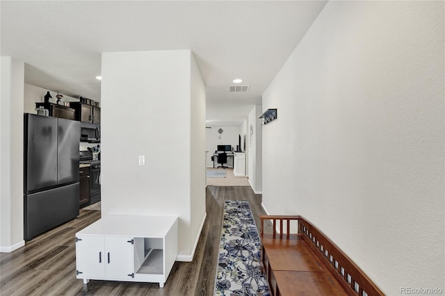 47349 Lily Ave, Bennett, CO 80102 - mudroom featuring wood finished floors, recessed lighting, and baseboards