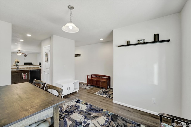 47349 Lily Ave, Bennett, CO 80102 - dining space featuring recessed lighting, wood finished floors, baseboards, and a ceiling fan