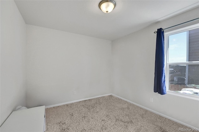 47349 Lily Ave, Bennett, CO 80102 - carpeted spare room with healthy amount of natural light and baseboards