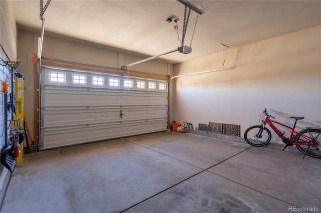 garage featuring a garage door opener