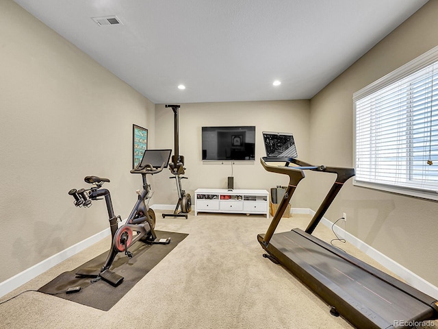 exercise area with recessed lighting, carpet flooring, baseboards, and visible vents