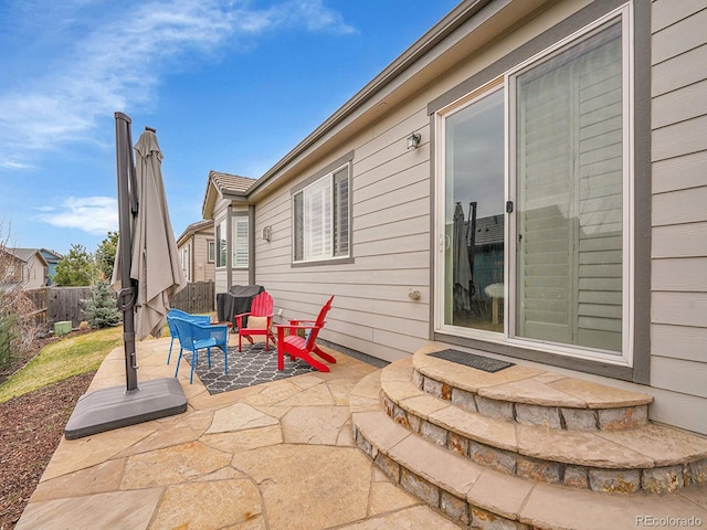 view of patio with fence
