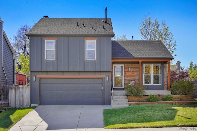 11446 W 105th Dr, Broomfield, CO 80021 - split level home featuring a garage, fence, board and batten siding, and concrete driveway