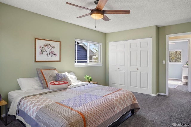 11446 W 105th Dr, Broomfield, CO 80021 - carpeted bedroom featuring a ceiling fan, a textured ceiling, baseboards, and a closet