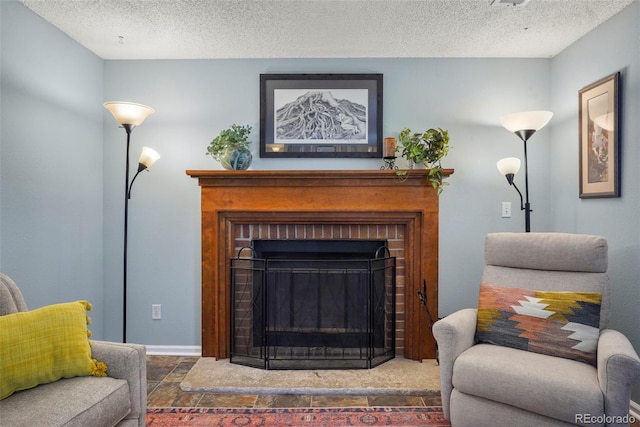 11446 W 105th Dr, Broomfield, CO 80021 - interior space with a textured ceiling, baseboards, and a fireplace