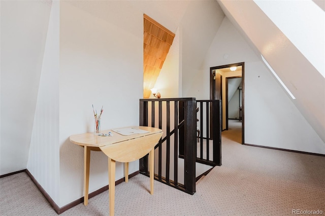 8691 S Warhawk Rd, Conifer, CO 80433 - bonus room featuring carpet flooring, lofted ceiling, and baseboards