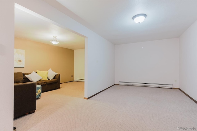 8691 S Warhawk Rd, Conifer, CO 80433 - additional living space with a baseboard radiator, carpet, and baseboards