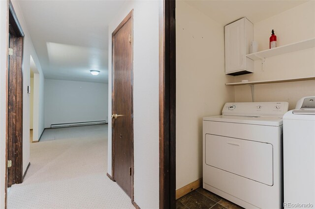 8691 S Warhawk Rd, Conifer, CO 80433 - clothes washing area with a baseboard radiator, independent washer and dryer, cabinet space, and baseboards