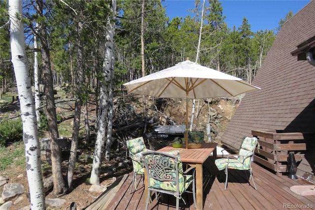 8691 S Warhawk Rd, Conifer, CO 80433 - deck with outdoor dining area