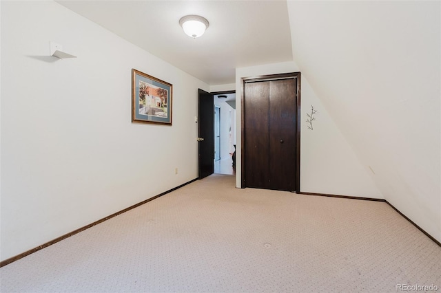 8691 S Warhawk Rd, Conifer, CO 80433 - unfurnished bedroom with light carpet and a closet
