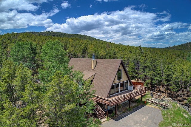 8691 S Warhawk Rd, Conifer, CO 80433 - view of subject property featuring a forest