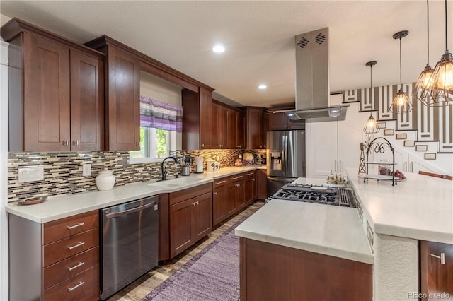 kitchen with island exhaust hood, a large island, stainless steel appliances, backsplash, and a sink