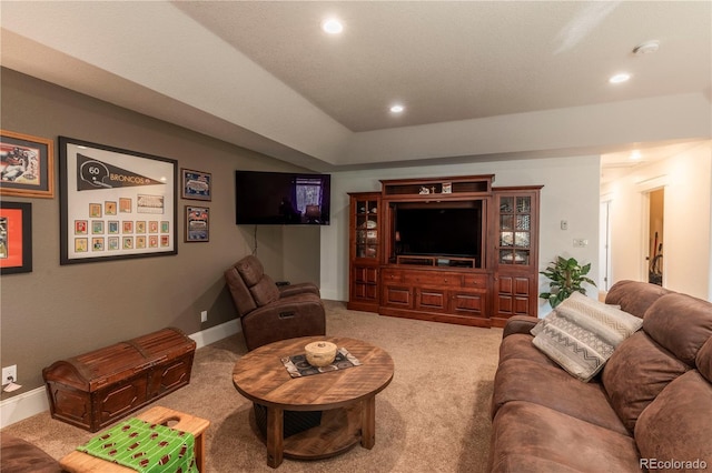 carpeted living room featuring baseboards and recessed lighting