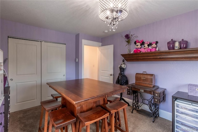 dining room with a textured ceiling, baseboards, a notable chandelier, and light colored carpet