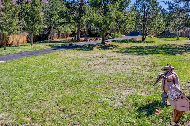 view of yard featuring fence