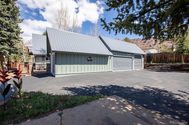 garage with fence