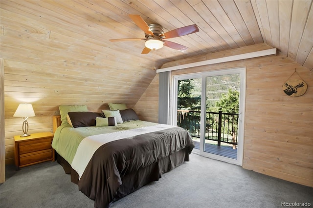 bedroom with lofted ceiling, wood walls, access to outside, and wood ceiling