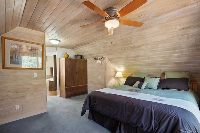 carpeted bedroom featuring vaulted ceiling, wooden walls, wood ceiling, and a ceiling fan
