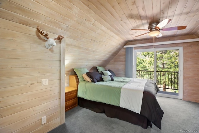 bedroom with wooden ceiling, vaulted ceiling, wooden walls, and access to outside