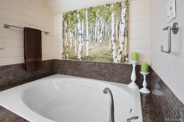 full bathroom with a garden tub