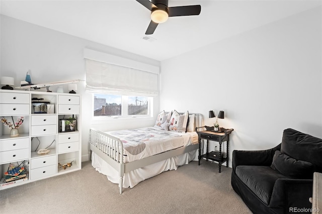 carpeted bedroom with ceiling fan