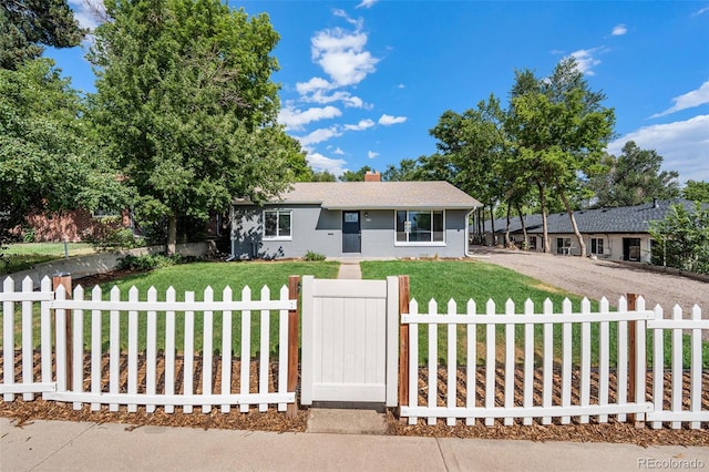 single story home with a front yard