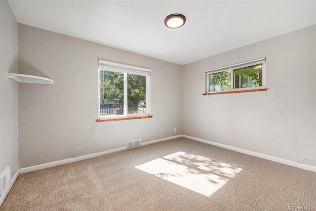 view of carpeted spare room