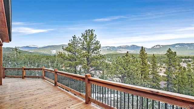 wooden terrace with a mountain view