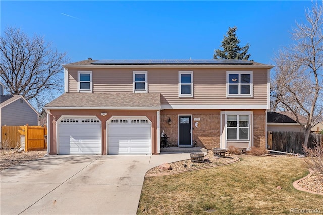 view of front of home featuring concrete driveway, an attached garage, fence, and brick siding