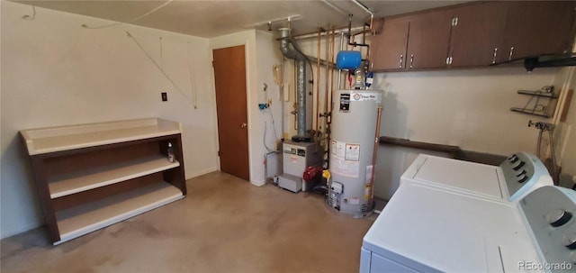 basement featuring water heater, a heating unit, and separate washer and dryer