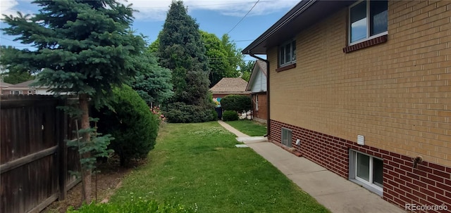 view of yard featuring fence