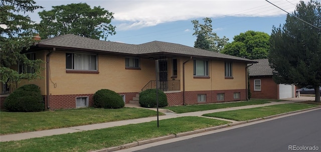 2903-2905 W 39th Ave, Denver, CO 80211 - single story home with a front yard, brick siding, a garage, a shingled roof, and an outdoor structure
