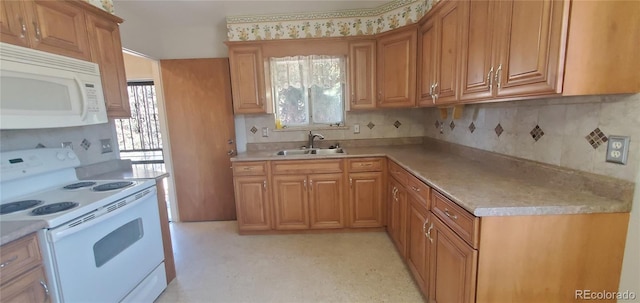 2903-2905 W 39th Ave, Denver, CO 80211 - kitchen with white appliances, a sink, plenty of natural light, and light countertops