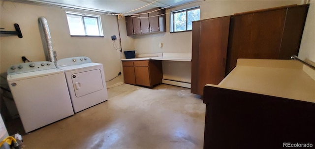 2903-2905 W 39th Ave, Denver, CO 80211 - washroom featuring cabinet space, baseboard heating, washing machine and clothes dryer, and plenty of natural light