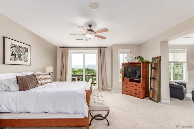 8993 Stonecrest Way, Highlands Ranch, CO 80129 - bedroom with access to exterior, light colored carpet, baseboards, and a ceiling fan