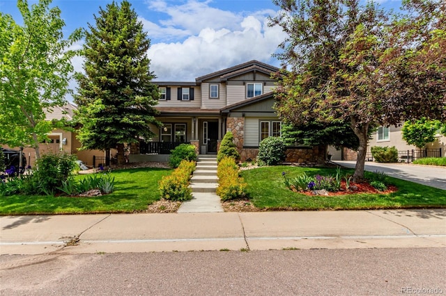 8993 Stonecrest Way, Highlands Ranch, CO 80129 - craftsman-style home featuring stone siding and a porch