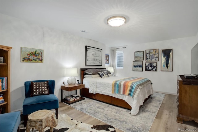 bedroom featuring light hardwood / wood-style floors