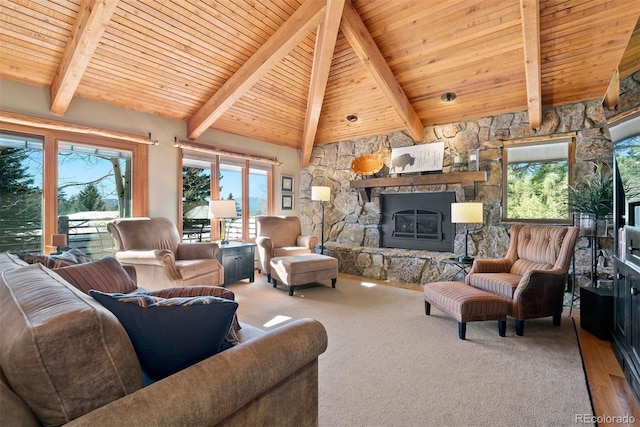 living room featuring high vaulted ceiling, a stone fireplace, carpet flooring, beamed ceiling, and wood ceiling