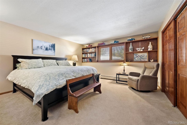 carpeted bedroom featuring a textured ceiling and a closet