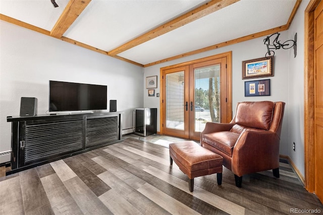 living area featuring french doors, beamed ceiling, and wood-type flooring