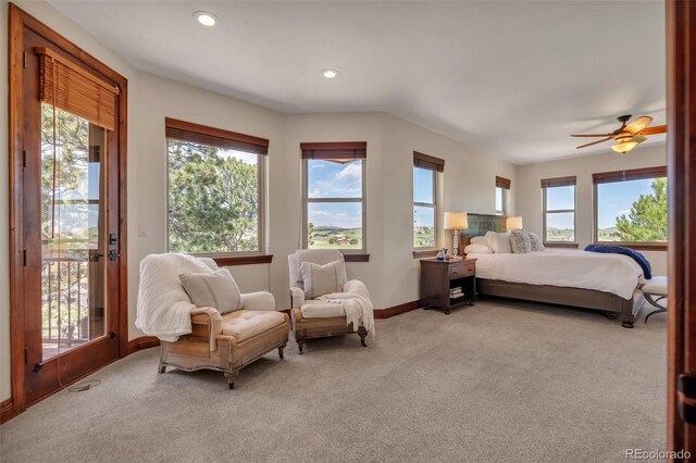 19336 Queens Crescent Way, Monument, CO 80132 - bedroom with light colored carpet, access to outside, multiple windows, baseboards, and recessed lighting
